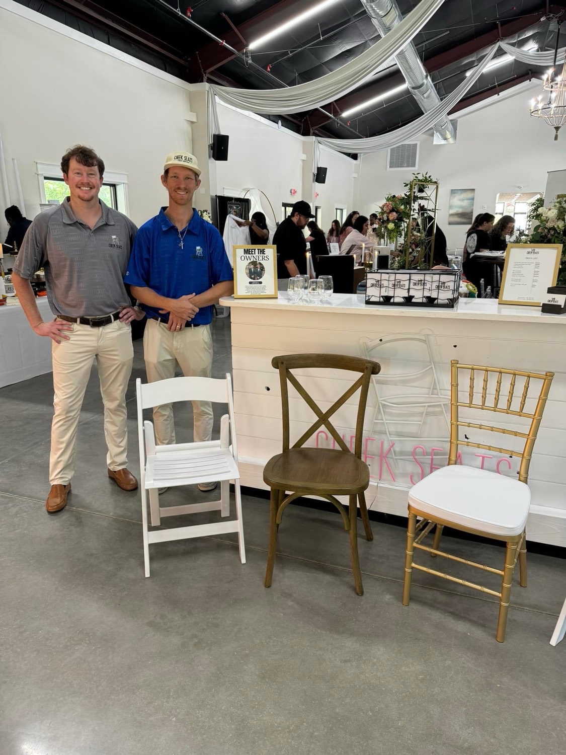 Cheek Seats owners Brett and Hunter with chair samples